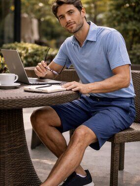 Greg Norman Blue Performance Shorts – Size 38